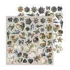Craft O'Clock Snow Games Festive Extras Set CC-F44-SWG-11 met knipafbeeldingen van ijsblauwe kerstballen, lantaarns, houten huisjes en sleeën op 30,5x31,5 cm papier.