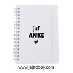 klein notitieboekje met naam