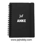 klein notitieboekje met naam